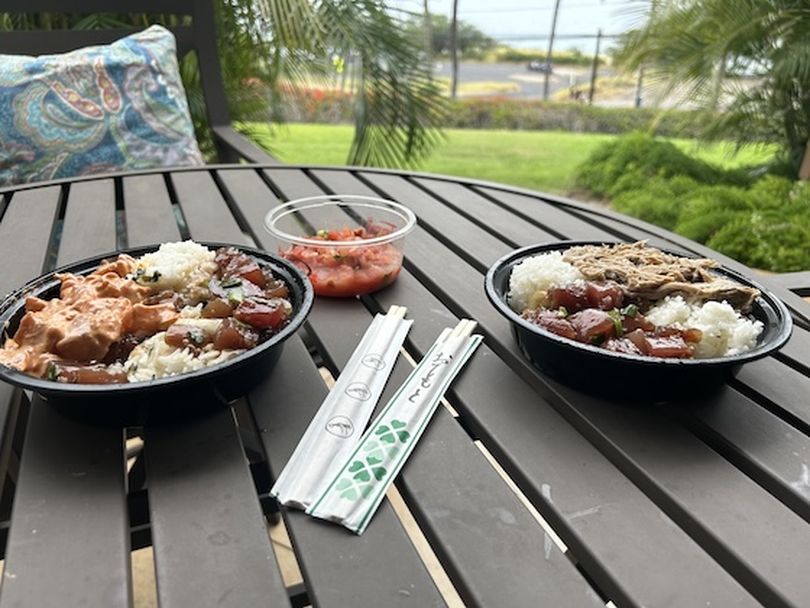Eating poke while watching the waves wash up on a Maui beach ... heaven. (Dan Webster)