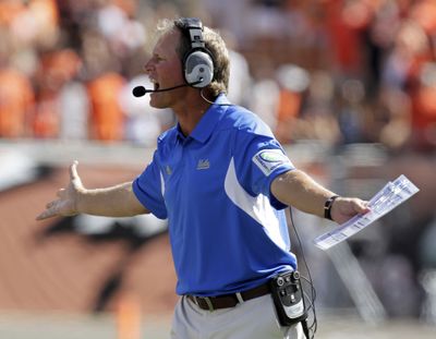 UCLA coach Rick Neuheisel is on the coaching hot seat in Los Angeles with a 17-25 record in his fourth year. (Associated Press)