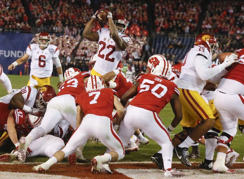 Southern California running back Justin Davis (22) scores a touchdown during the first half of the Holiday Bowl.