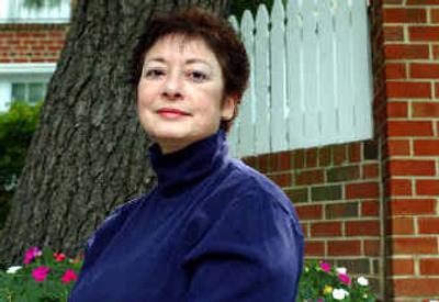 
Leukemia patient Connie Ojile sits outside her Arlington, Va home, last week. Medical experiments can offer tantalizing hope to the very ill, but tracking them down and getting enrolled can be incredibly difficult. 
 (Associated Press / The Spokesman-Review)
