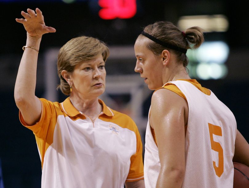 Tennessee coach Pat Summitt, left, instructs former University High standout Angie Bjorklund during practice for the NCAA Women's Final Four basketball game on April 5, 2008, in Tampa, Fla. Summitt died on Tuesday at age 64. (Gerry Broome / Associated Press)