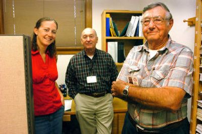 
Sarah Knott, left and Ted Nelson, right, are mentors with the Kootenai County juvenile mentors program, which is organized by Jim Simmerman, center. 
 (Jesse Tinsley / The Spokesman-Review)