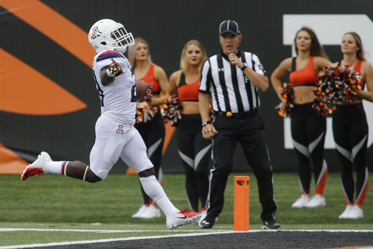 Arizona running back J.J. Taylor, celebrates as he crosses the goal line on a 40 yard touchdown run in the first quarter of an NCAA college football game against Oregon State, in Corvallis, Ore., Saturday, Sept 22, 2018. (Timothy J. Gonzalez / AP)