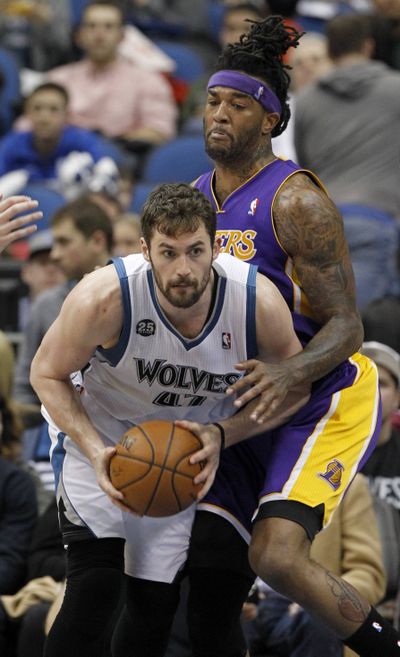 Minnesota’s Kevin Love led a rout of the slumping Lakers. (Associated Press)