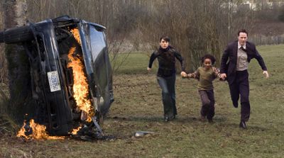 Jennifer Connelly, left, Jaden Smith and Keanu Reeves star in “The Day the Earth Stood Still.”  (Associated Press / The Spokesman-Review)