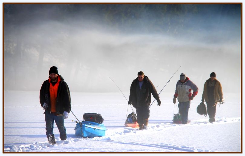 Ice fisherman trudging across Dawson Lake, northeast of Bonners Ferry. (Marianne Love/Slight Detour photo)