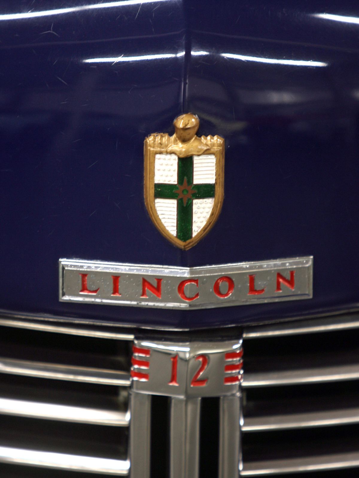 The front grille of a 1942 Lincoln Continental two-door coupe, which had a V-12 engine.