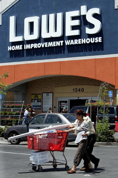 
Shoppers leave a store  in San Bruno, Calif.
 (Associated Press / The Spokesman-Review)