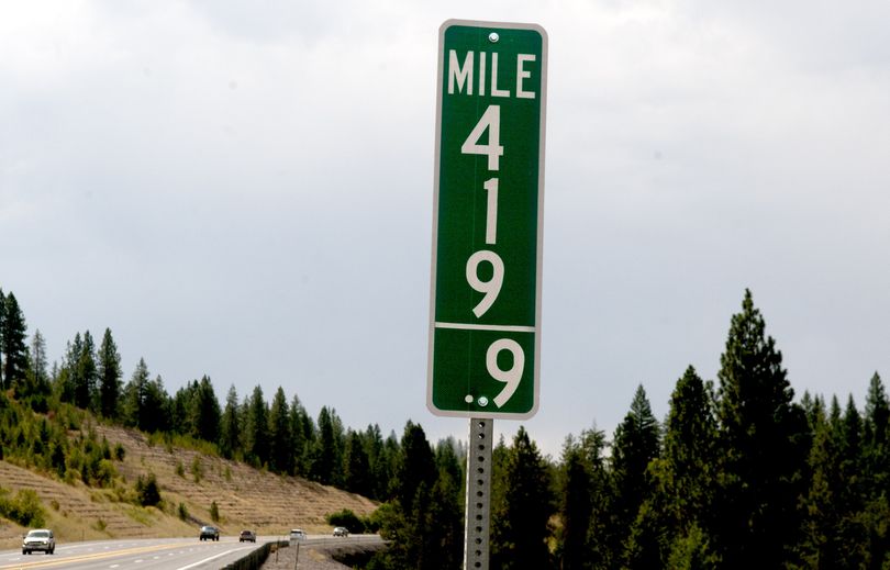 Cars stream past milepost 419.9 just south of Coeur d’Alene on U.S. Highway 95 on Tuesday. Idaho joins Colorado in replacing its milepost 420 signs with milepost 419.9 designations in an effort to thwart growing thievery. Authorities suspect the signs are prized among potheads enamored with its drug culture double-entendre. (Kathy Plonka)