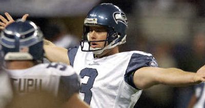 
Seahawks QB Matt Hasselbeck looks for a receiver during the first half.  
 (Associated Press / The Spokesman-Review)