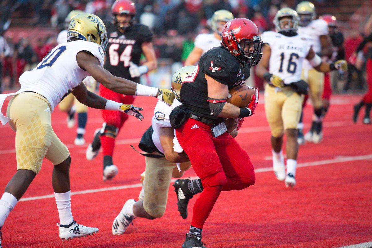 Eastern Washington’s Sam McPherson  scores on a 12-yard touchdown run during a game against UC Davis at Roos Field in Cheney on Nov. 10. (Libby Kamrowski / The Spokesman-Review)