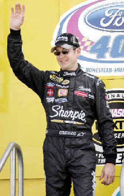 
Kurt Busch waves to fans as he is introduced at the Homestead Miami Speedway in Homestead, Fla. last Sunday.
 (Associated Press / The Spokesman-Review)