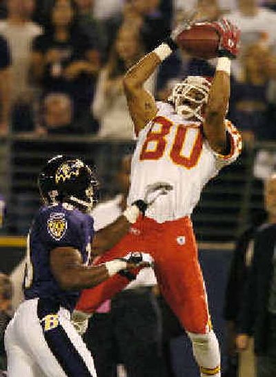 
Wide receiver Johnnie Morton helped Kansas City dominate Raymond Walls and Baltimore.  
 (Associated Press / The Spokesman-Review)