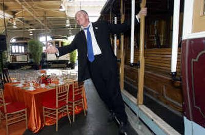 
London Mayor Ken Livingstone, posing on a cable car at the Cable Car Barn in San Francisco on Friday, told fellow municipal leaders how he cleared up London's chronic traffic jams by imposing steep fees on cars entering the city center. He spoke at the United Nations World Environment Day Conference. 
 (Associated Press / The Spokesman-Review)