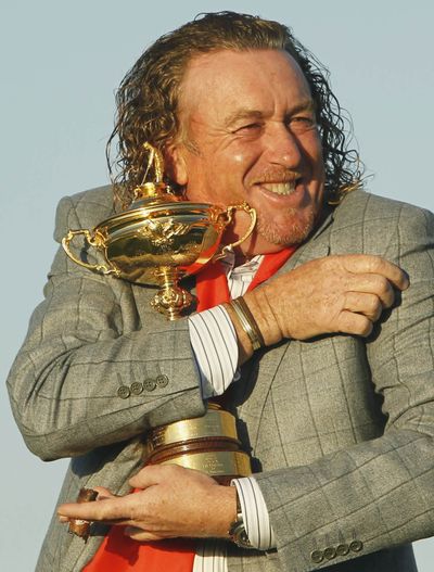 Europe’s Miguel Angel Jimenez can’t let go of the prize. (Associated Press)