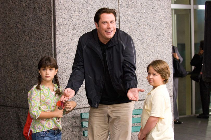 From left, Ella Bleu Travolta, John Travolta and Conner Rayburn in “Old Dogs,” a comedy also starring Robin Williams. Disney (Disney)