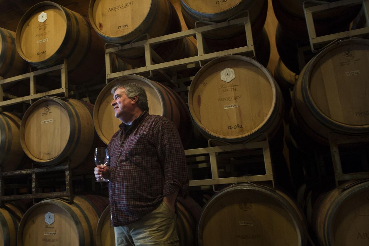 Arbor Crest winemaker Chris Farrington samples wine during a tour on Thursday, Feb. 4, 2016, at Arbor Crest Wine Cellars production facility on East Buckeye Avenue in Spokane. (Tyler Tjomsland / The Spokesman-Review)