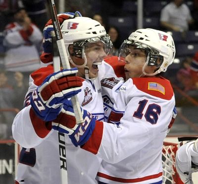 Chiefs Darren Kramer and Mike Aviani celebrates Spokane's first goal by Kramer in the first period against Vancouver, March 28, 2012 in the Spokane Arena. (Dan Pelle / The Spokesman-Review)