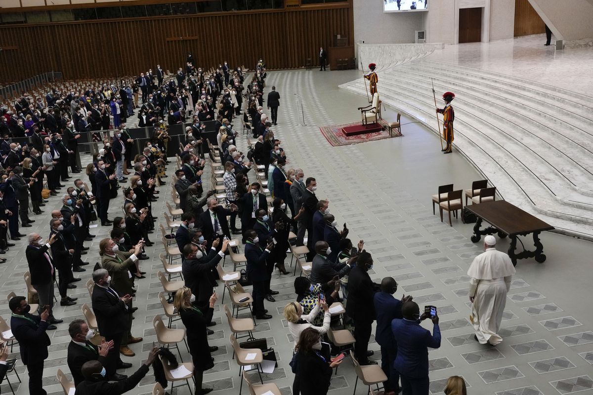 Pope Francis arrives to meet with the participants to the inter-parliamentary meeting on the COP26 in the Paul VI Hall at the Vatican, Saturday, Oct. 9, 2021.  (Gregorio Borgia)