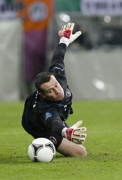 Ireland goalkeeper Shay Given fails to block a shot by Spain’s David Silva during the Euro 2012 soccer championship. (Associated Press)