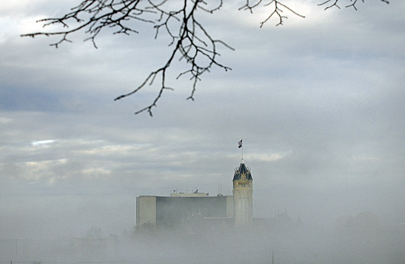 The classic architecture of the Spokane County Courthouse rises above the fog covering downtown Spokane Wash. Wed. January 13, 2010. (Christopher Anderson / The Spokesman-Review)