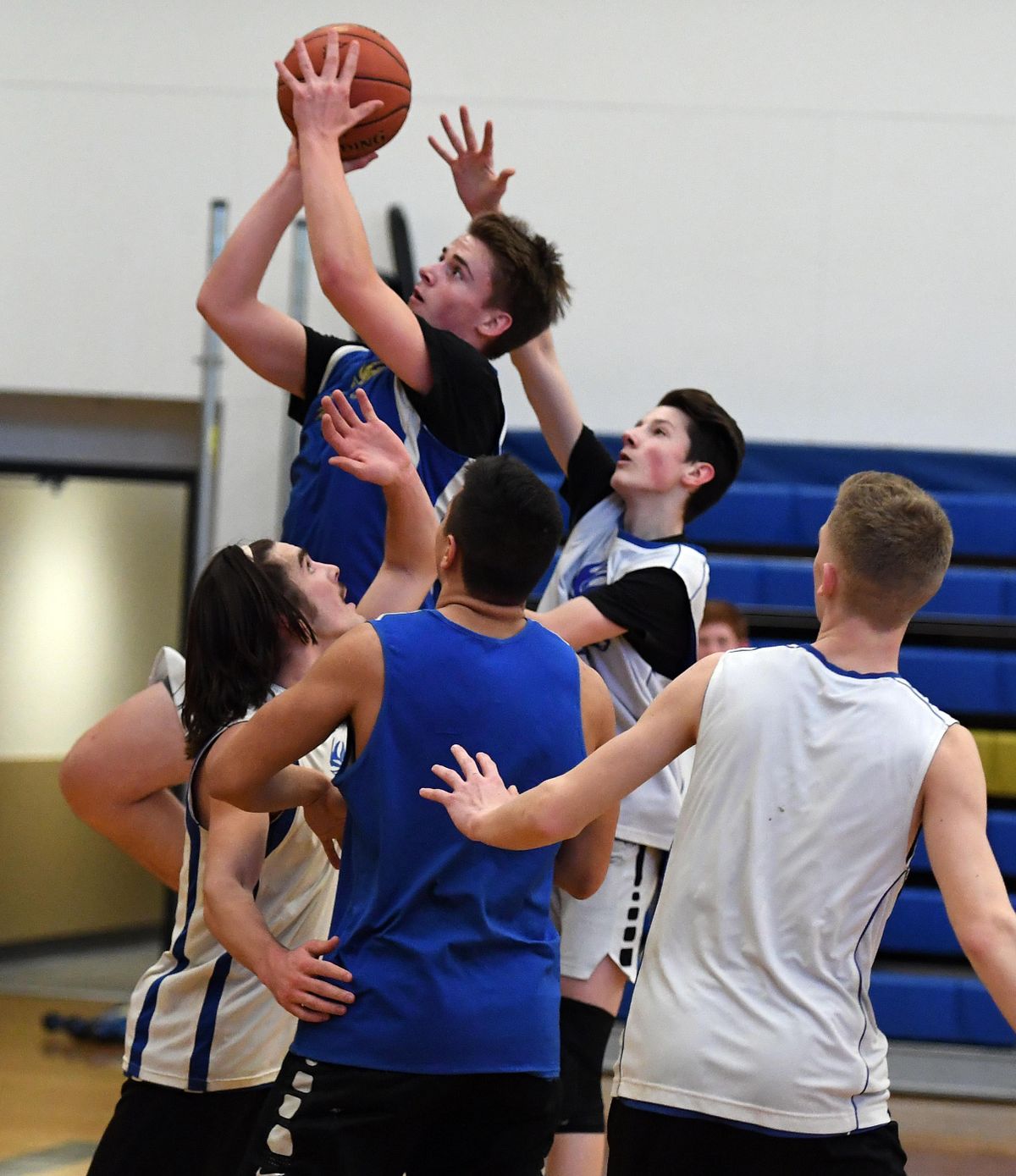 Deer Park High School varsity basketball player Gavin Hanson takes a shot at the basket during practice, Monday, Feb 10, 2020, at Deer Park High School. (Colin Mulvany / The Spokesman-Review)