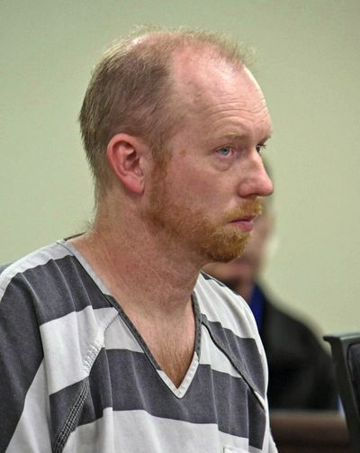 In this April 5, 2019 photo, Chad Isaak listens while being charged with four counts of class AA felony murder in district court in Mandan, N.D. Isaak, accused of killing four people at a North Dakota property management compan, has waived a preliminary hearing and pleaded not guilty to murder charges. Isaak's trial is set to begin this week.  (Tom Stromme)