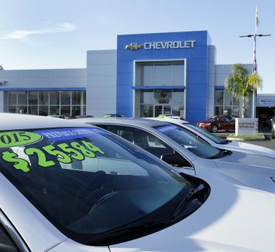 In this Nov. 7, 2015 file photo, Chevrolet vehicles are fo sale at a dealership in Fremont, Calif. (Ben Margot / AP)
