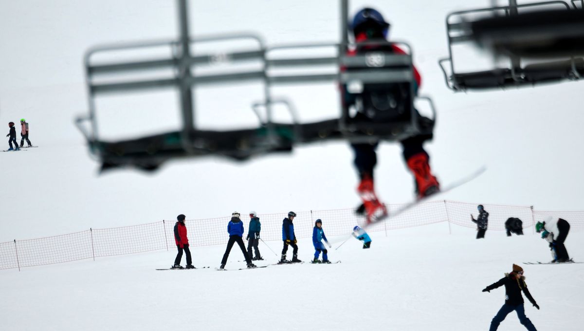 Skiers and snowboarders enjoy their time at Mt. Spokane Ski and Snowboard Park on Friday.  (Kathy Plonka/The Spokesman-Review)
