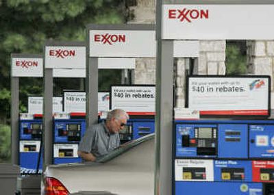 
Exxon Mobil Corp. on Friday posted the largest annual profit by a U.S. company – $40.6 billion – as the world's biggest publicly traded oil company benefited from historic crude prices at year's end. Associated Press
 (File Associated Press / The Spokesman-Review)