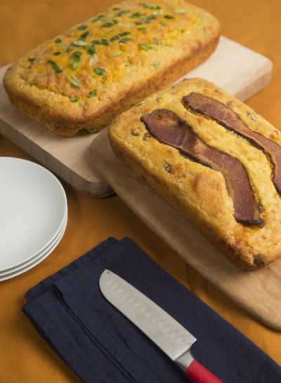 Two versions of delicious corn bread: one with bacon in and on top of it, another with cheese and jalapeños. (Jesse Tinsley)