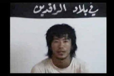 
A video posted Tuesday on a militant Islamic Web site shows what it claimed was a Japanese captive kidnapped by Abu Musab al-Zarqawi's group.
 (Associated Press / The Spokesman-Review)