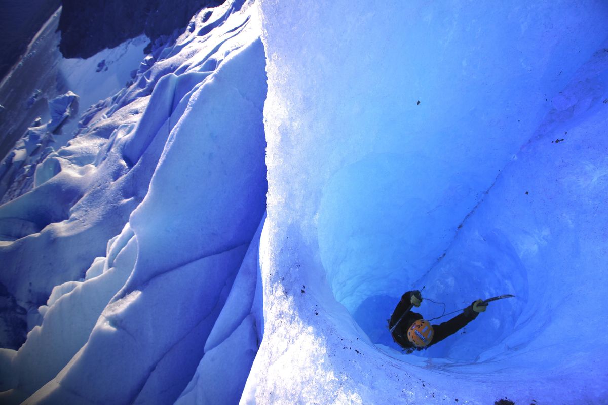 An ice climber ascends at Alaska’s Mendenhall Glacier during filming of “Blue Obsession,” a 2011 Banff Mountain Film Festival finalist.