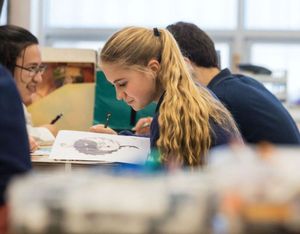 Sequoia Wheelan, a ninth-grade student at Coeur d’Alene Charter Academy, works on an art project during class Tuesday in the school’s new fine arts wing. (Shawn Gust / Coeur d'Alene Press)