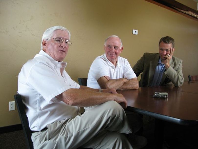 Jim Palin, left, father of Todd Palin; Chuck Heath, center, father of Sarah Palin, and Vaughn Ward, right, an Idaho Republican congressional candidate discuss politics during a stop in Caldwell, Idaho, in which the two dads were campaigning for Ward. (Betsy Russell / The Spokesman-Review)