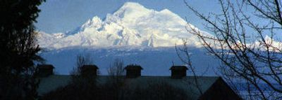 
As seen from Sequim, a hiking route around Mount Baker seems as though it could be a walk in the park. However, the U.S. Forest Service has never found a reasonably manageable trail route around the volcanic peak. Two Western Washington hikers went out on foot to learn why. 
 (File Associated Press / The Spokesman-Review)