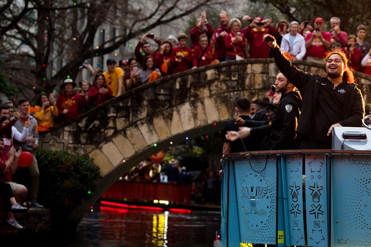 Iowa State  players wave to fans during the Alamo Bowl  Pep Rally on Wednesday  in San Antonio. (Tyler Tjomsland / The Spokesman-Review)