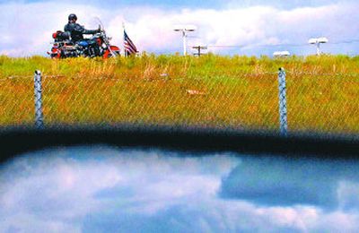 
A motorcyclist  heads east on Interstate 90 through Post Falls on Thursday.   As the state kicks off Motorcycle Awareness Month,  officials are asking drivers to watch out for motorcycles. 
 (Kathy Plonka / The Spokesman-Review)