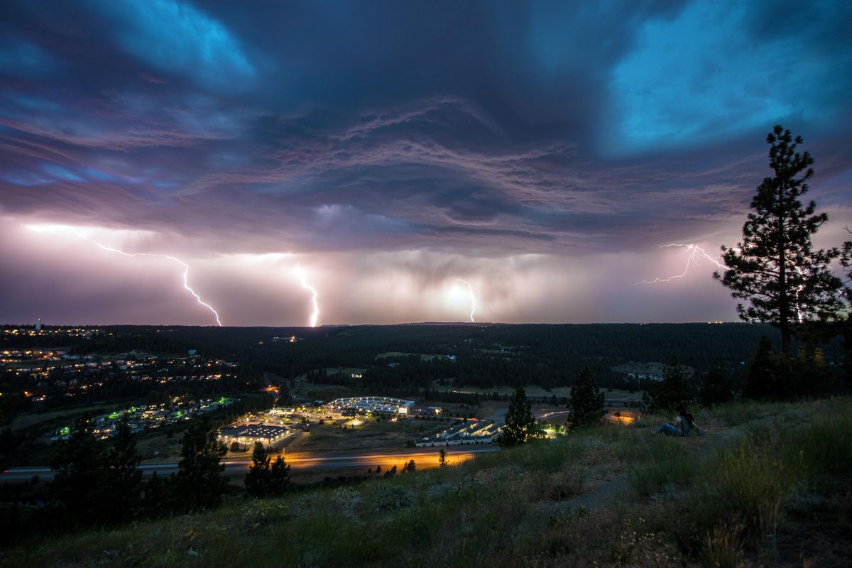 Tiffany Hansen took this photo of a lightning strikes on Tuesday July 23, 2019 from an overlook on High Drive, above Spokane. (TIFFANY HANSEN / COURTESY)