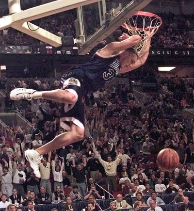 Gonzaga’s Casey Calvary dunks against Minnesota in an NCAA Tournament first-rounder at KeyArena in Seattle on March 11, 1999. Gonzaga won 75-63.  (Spokesman-Review Wire Archives)