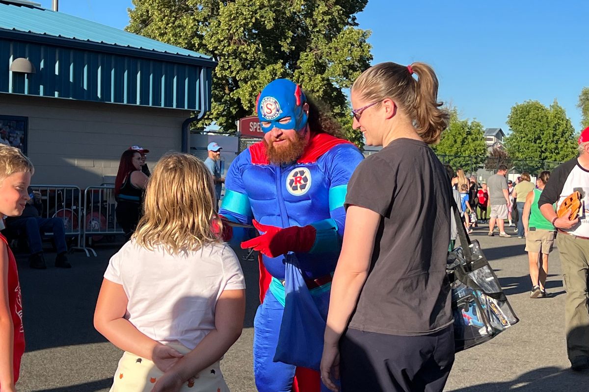 Recycleman, aka Brad Bishop, meets with fans before his final appearance at the Spokane Indians game on Sunday, Sept. 4, 2022.   (Quinn Welsch/The Spokesman-Review)