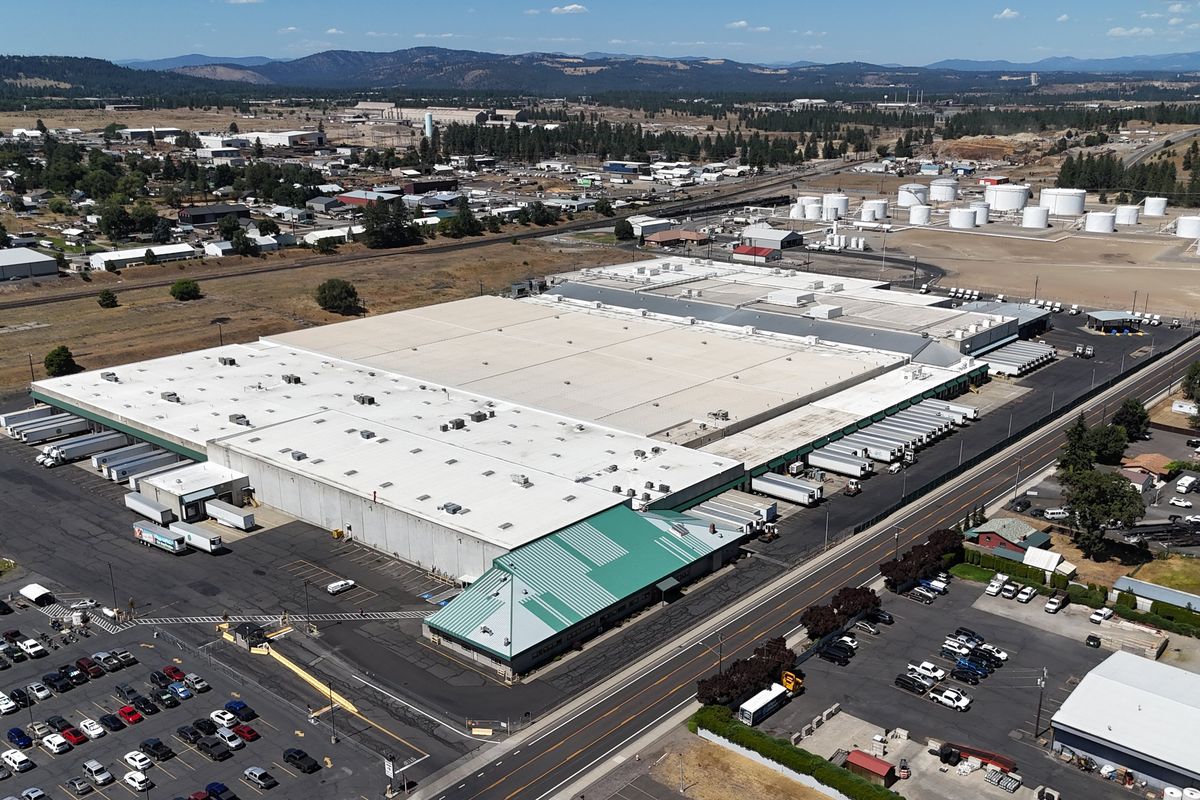 Present day: The first section of the URM Stores distribution warehouse at 7511 North Freya Street was built around 1960, but then expanded several times. (Jesse Tinsley/THE SPOKESMAN-REVIEW)