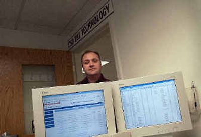 Dalton Bly of ESD 101 shows the Web interface for the C.O.L.D. system that will alert media outlets on school closings.
(Brian Plonka / The Spokesman-Review)