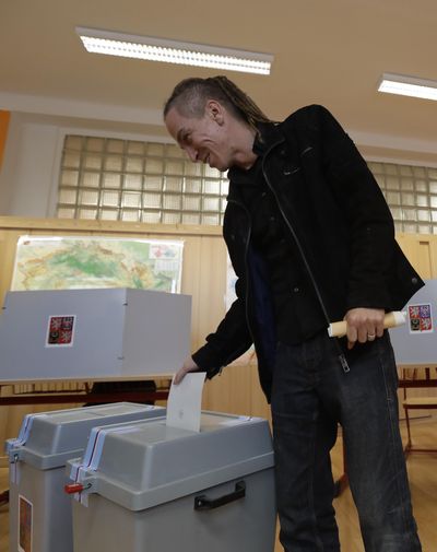 Chairman of the Czech Pirate party Ivan Bartos casts his vote during the parliamentary elections in Prague, Czech Republic, Friday, Oct. 20, 2017. (Petr David Josek / Associated Press)