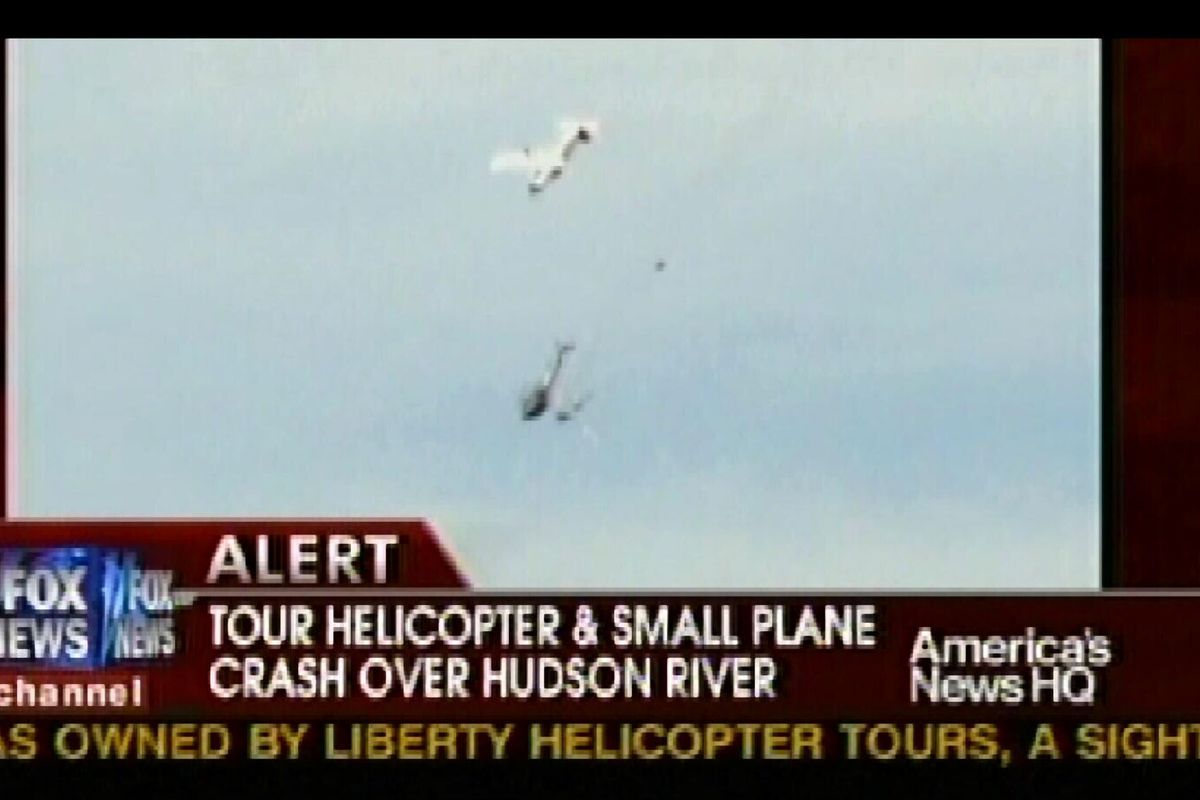 In this image rendered from video and released by Fox News Channel, a small plane and a sightseeing helicopter carrying five Italian tourists are seen shortly after colliding above the Hudson River on Saturday. (The Spokesman-Review)