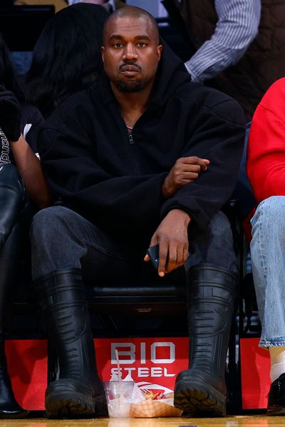 Kanye West attends an NBA game between the Washington Wizards and the Los Angeles Lakers at Crypto.com Arena on March 11, 2022, in Los Angeles. (Ronald Martinez/Getty Images/TNS)  (Ronald Martinez/Getty Images North America/TNS)