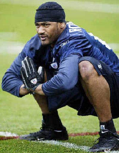 
 Koren Robinson stretches during practice Friday.
 (Associated Press / The Spokesman-Review)