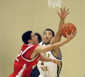 Shadle Park’s Anthony Brown shows his versatility with solid defense against Ferris last Friday. (Christopher Anderson / The Spokesman-Review)