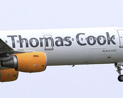 A Thomas Cook plane takes off in May 2016 in England. More than 600,000 vacationers who booked through tour operator Thomas Cook were on edge Sunday, wondering if they will be able to get home, as one of the world's oldest and biggest travel companies teetered on the edge of collapse. The debt-laden company, which confirmed Friday it was seeking $250 million in funding to avoid going bust, was in talks with shareholders and creditors to stave off failure. (Tim Goode / AP)