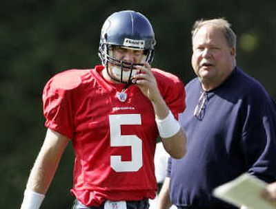 
New Seahawks quarterback Charlie Frye works out under the watchful eye of head coach Mike Holmgren. Associated Press
 (Associated Press / The Spokesman-Review)